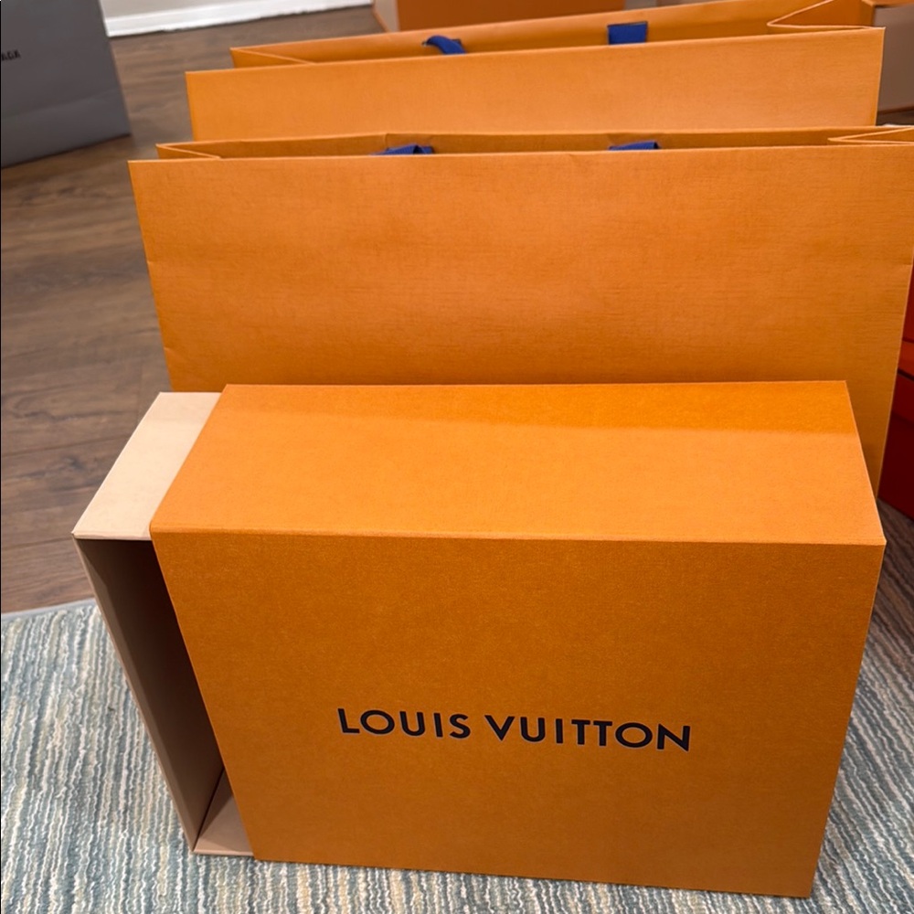 Louis Vuitton Orange Gift Box with shopping bag .